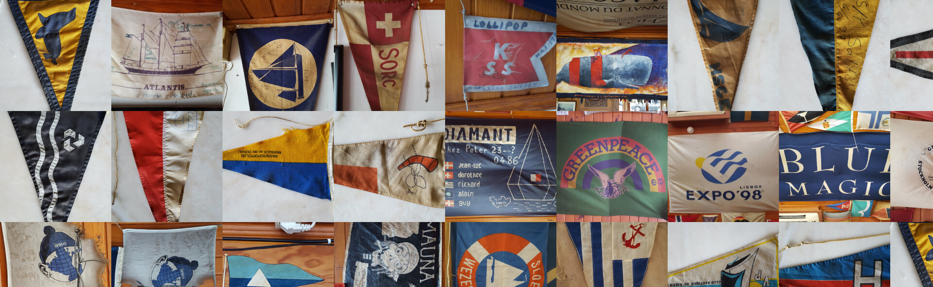   Interior of Peter Cafe Sport with some flags offered by yachts from all over the world 