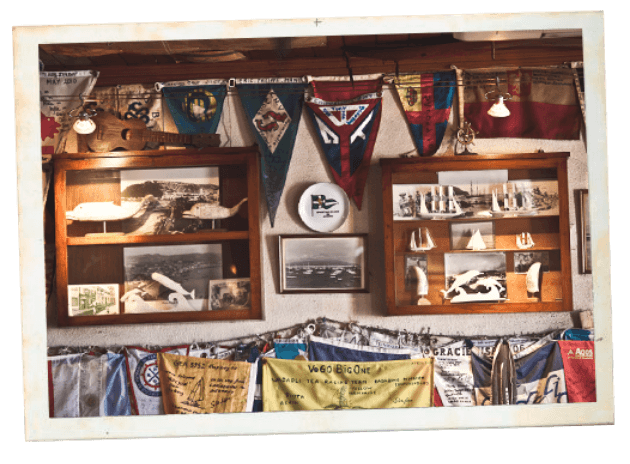  Interior of Peter Cafe sport with some old photographs, sailboat flags, and ivory pieces